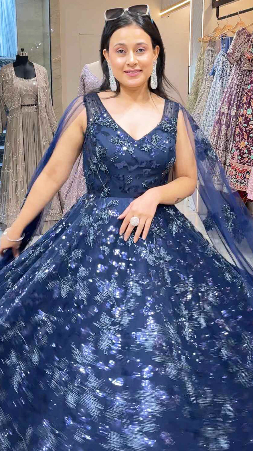 Sequins & tube work on net midnight blue engagement gown with falling sleeves