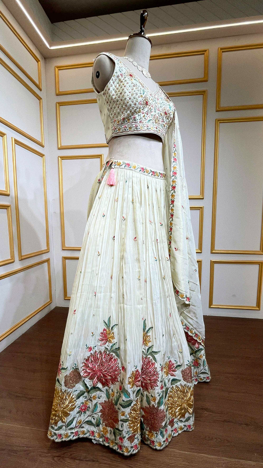 Crushed tissue lehenga with dabka & pearl work on choli in ivory gold