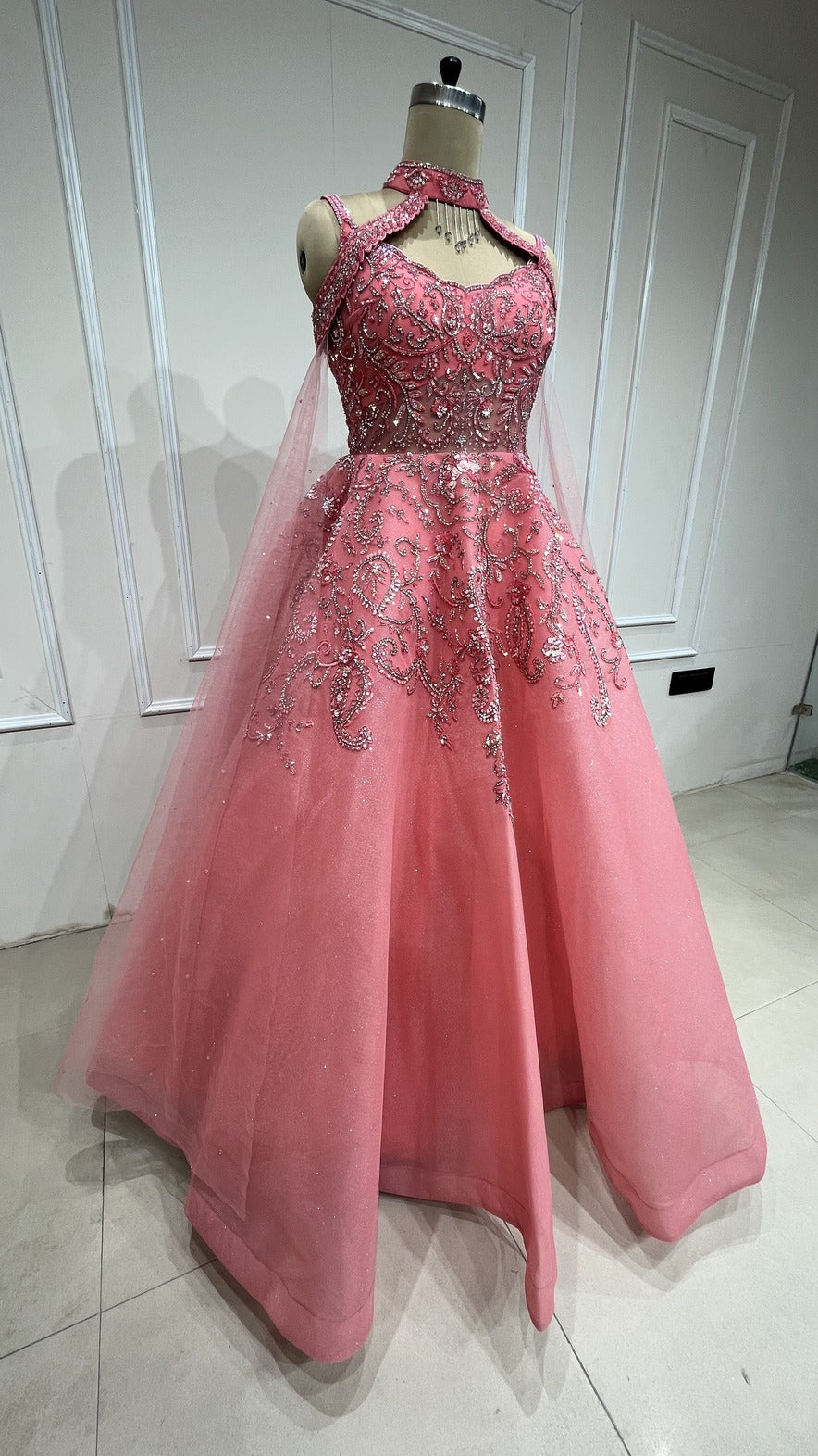 Carrot peach engagement gown with crystal & cut dana work on mesh