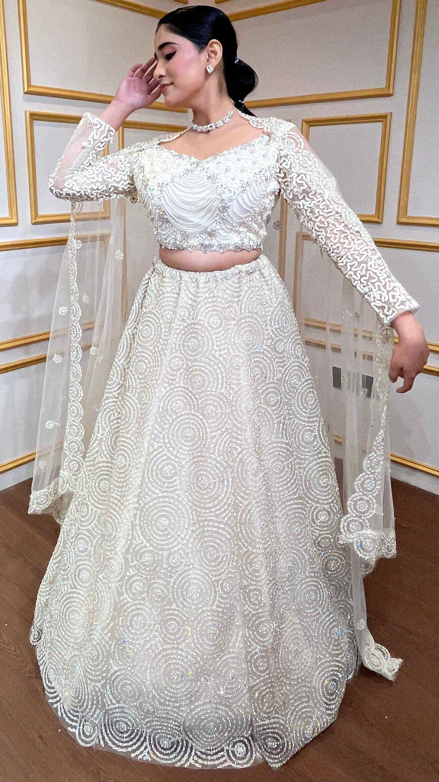 Ivory net lehenga with pearl & crystal
