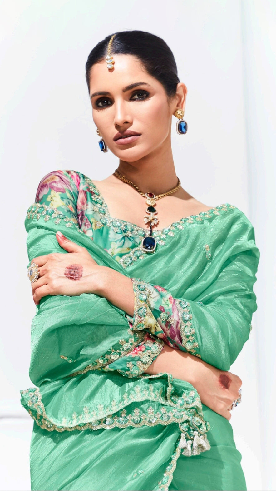 Mint green saree with printed blouse and gota patti work in glaze organza