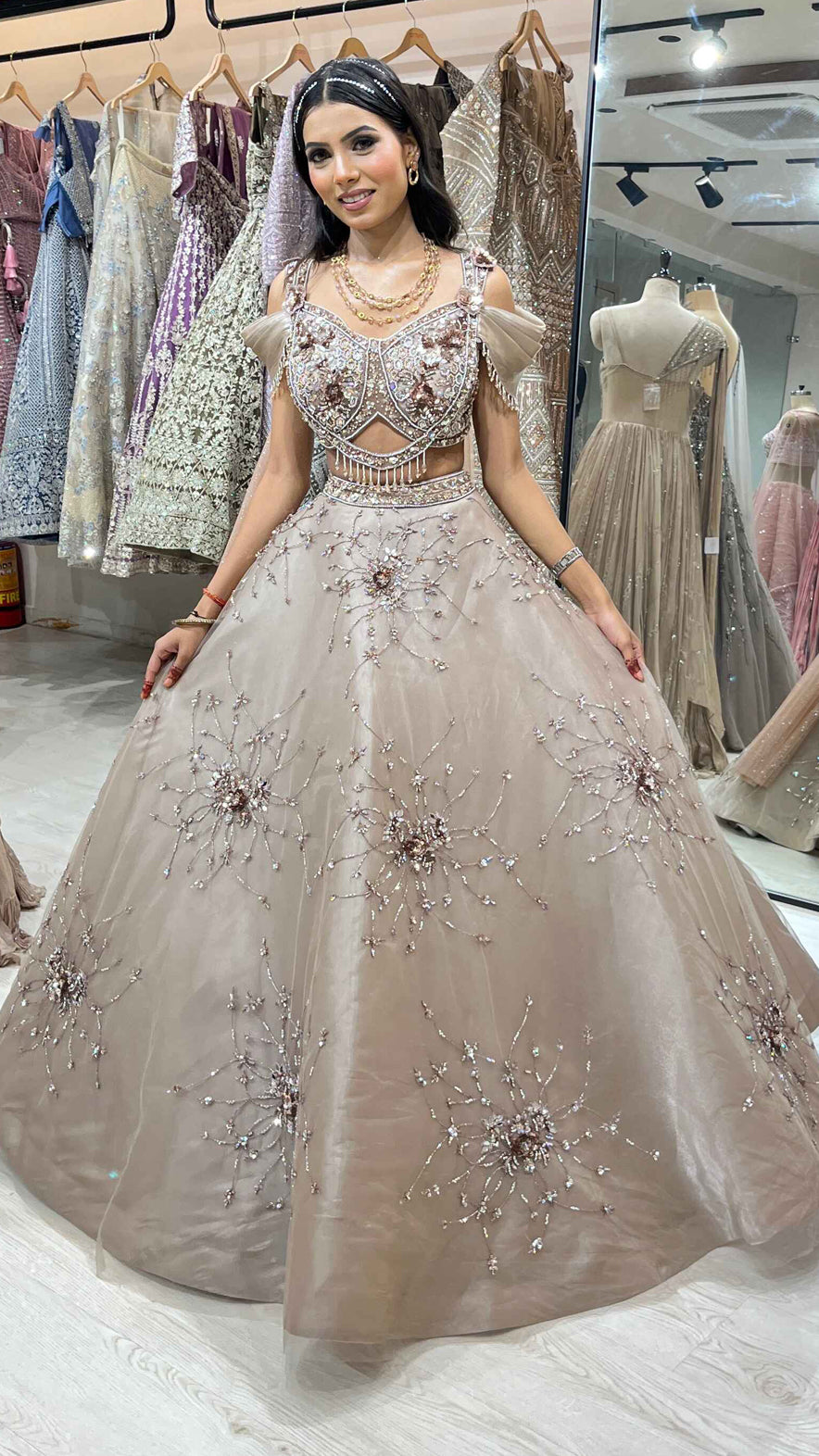 Mirror & pearl work on camel brown net ball lehenga