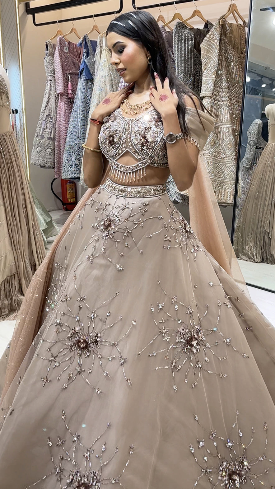 Mirror & pearl work on camel brown net ball lehenga