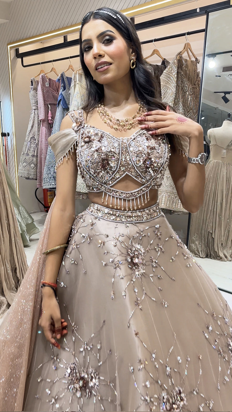 Mirror & pearl work on camel brown net ball lehenga