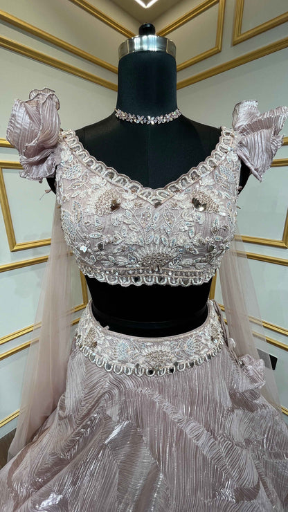 Baby pink lehenga choli in crush tissue with sequins & stone