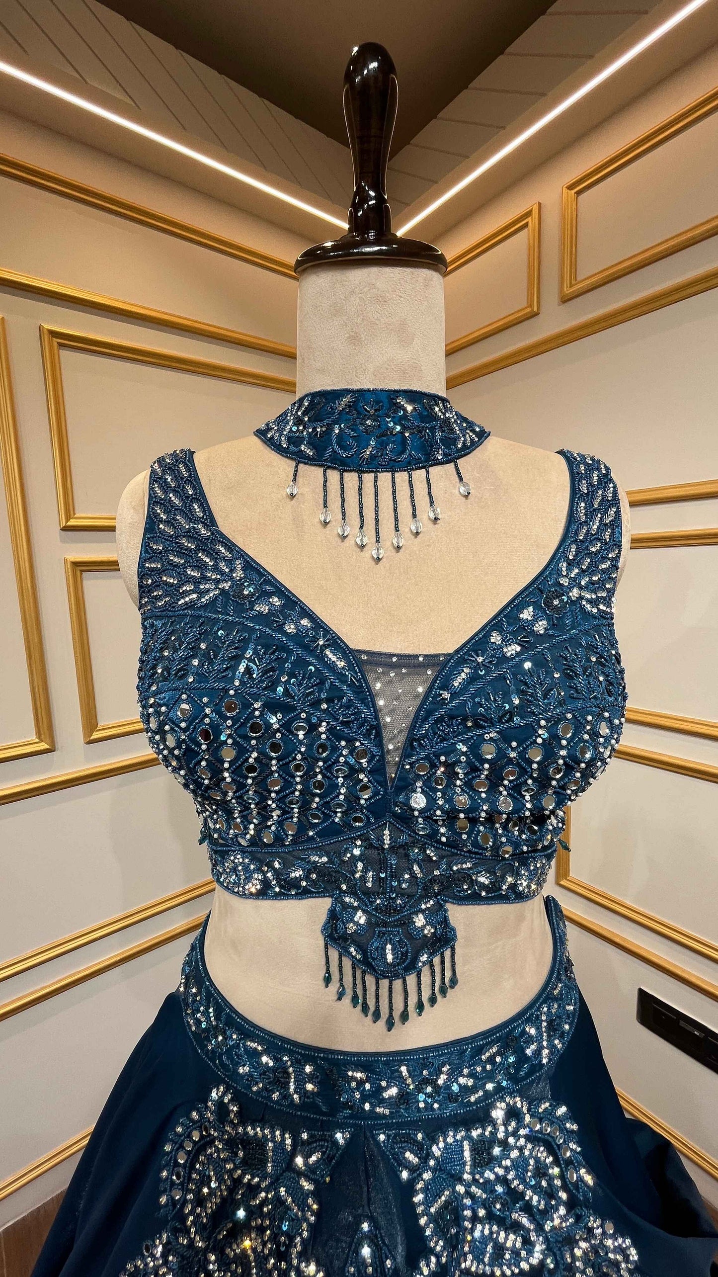 Peacock blue lehenga choli in organza with stone & mirror