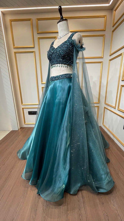 Bottle green organza lehenga choli with crystal & sequins