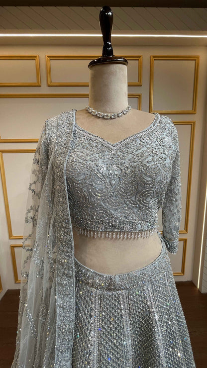 Zarkan & thread work lehenga on net in ash grey