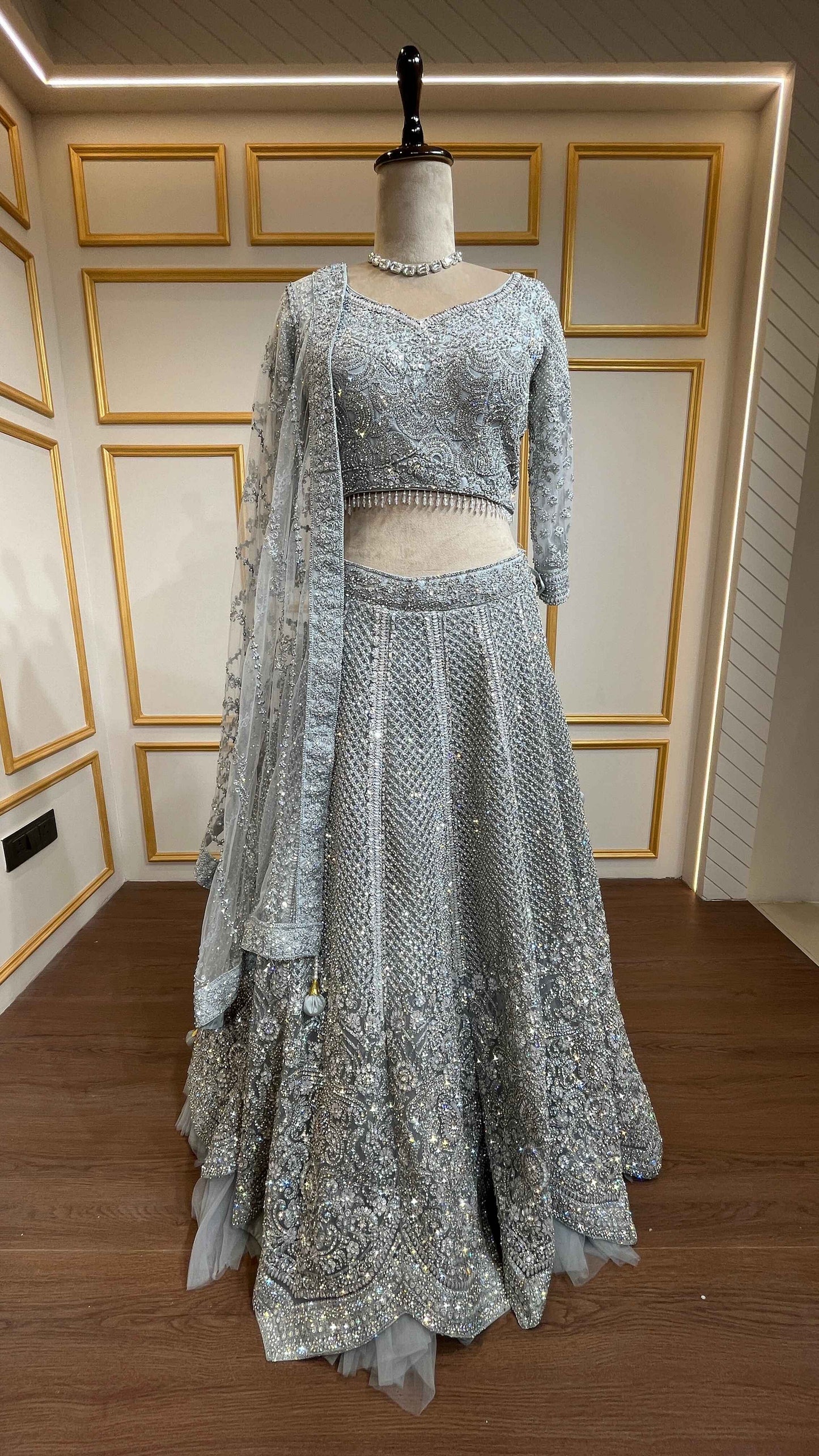Zarkan & thread work lehenga on net in ash grey
