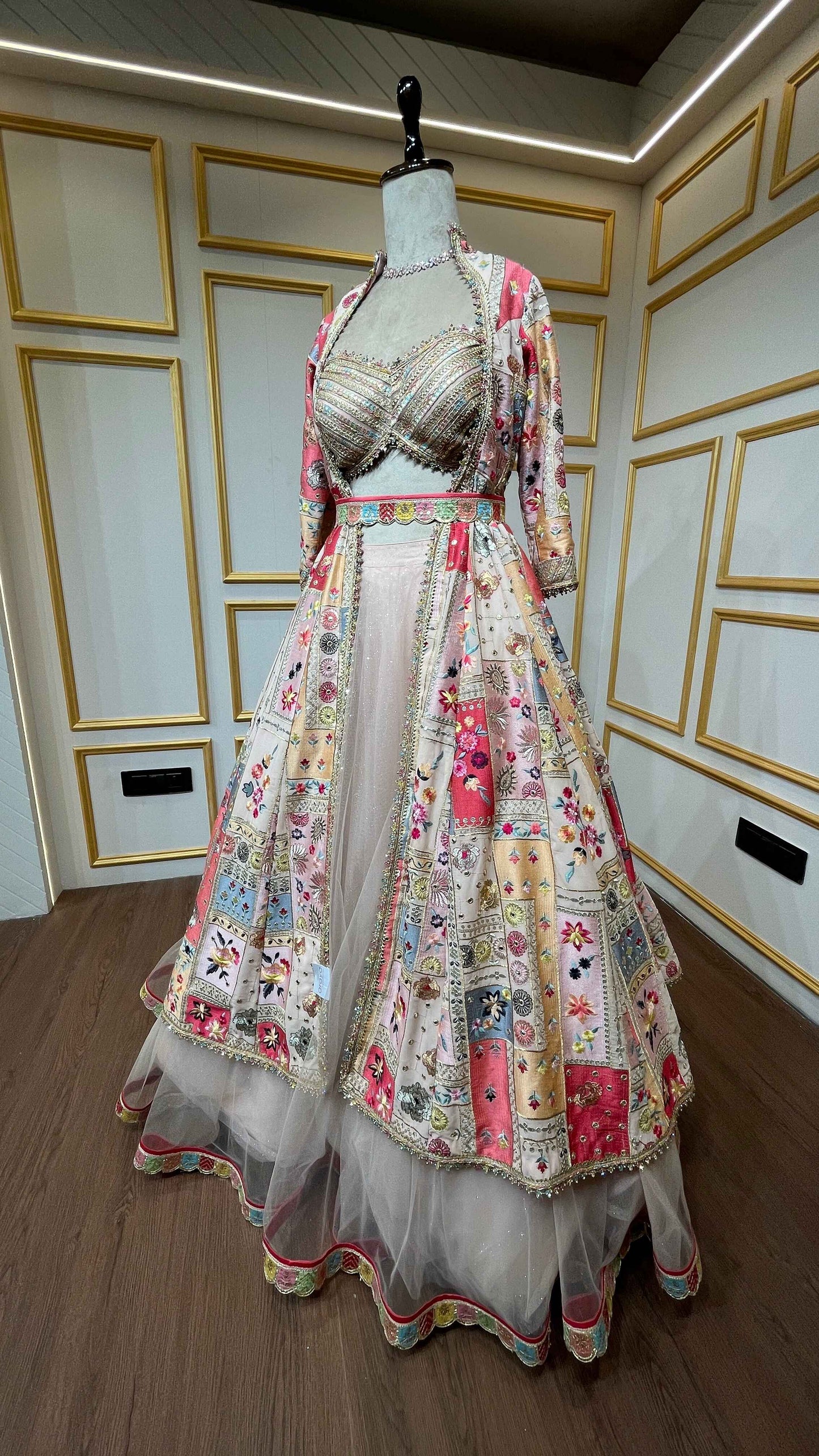 Thread & gota Patti work on georgette jacket with shimmer net skirt in multicolor
