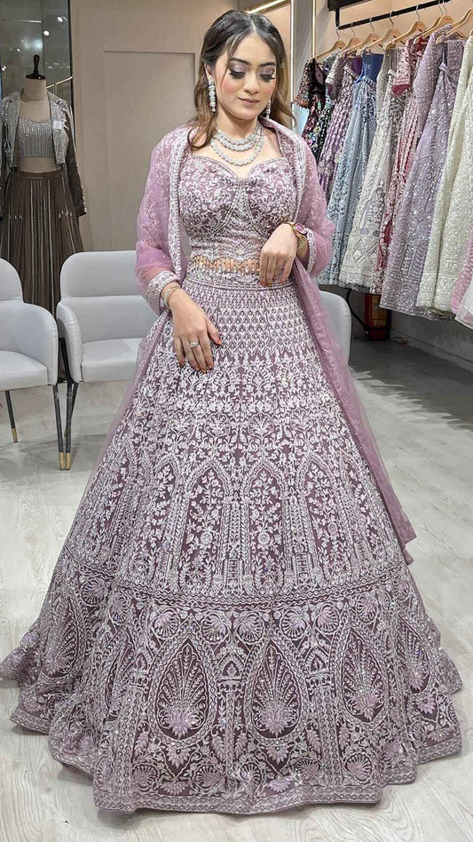 Dusty mauve lehenga with crystal & zari work on net with heavy dupatta