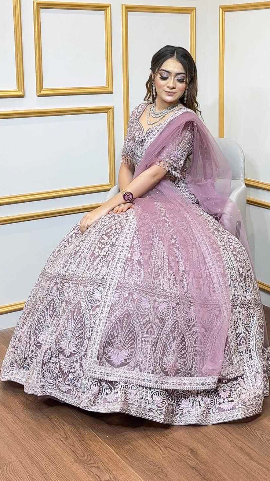 Dusty mauve lehenga with crystal & zari work on net with heavy dupatta