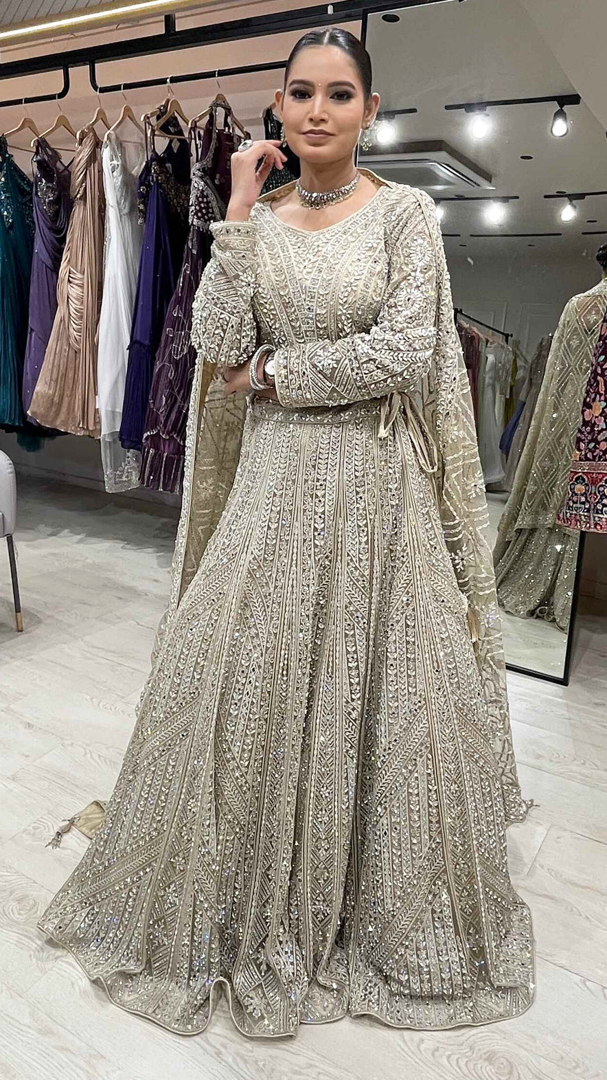 Cream gold bridesmaid lehenga with  & cut dana work on net with embroidered dupatta