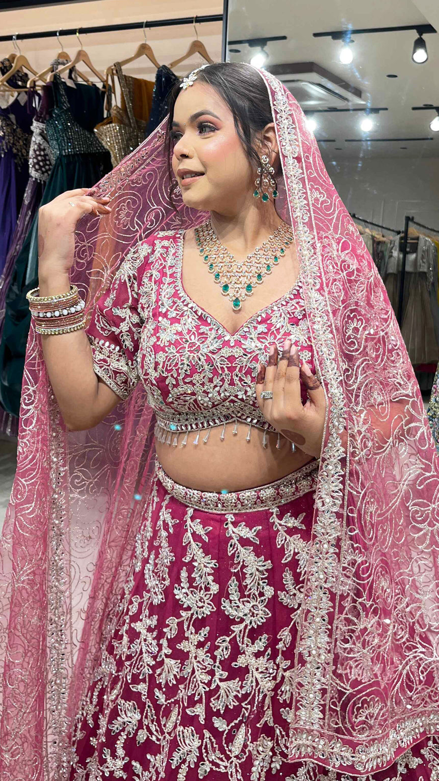 Magenta lehenga with zari & mirror on net with heavy dupatta