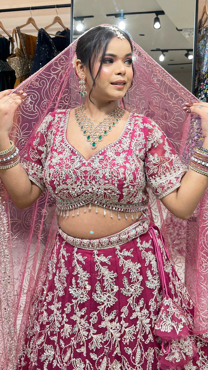 Magenta lehenga with zari & mirror on net with heavy dupatta