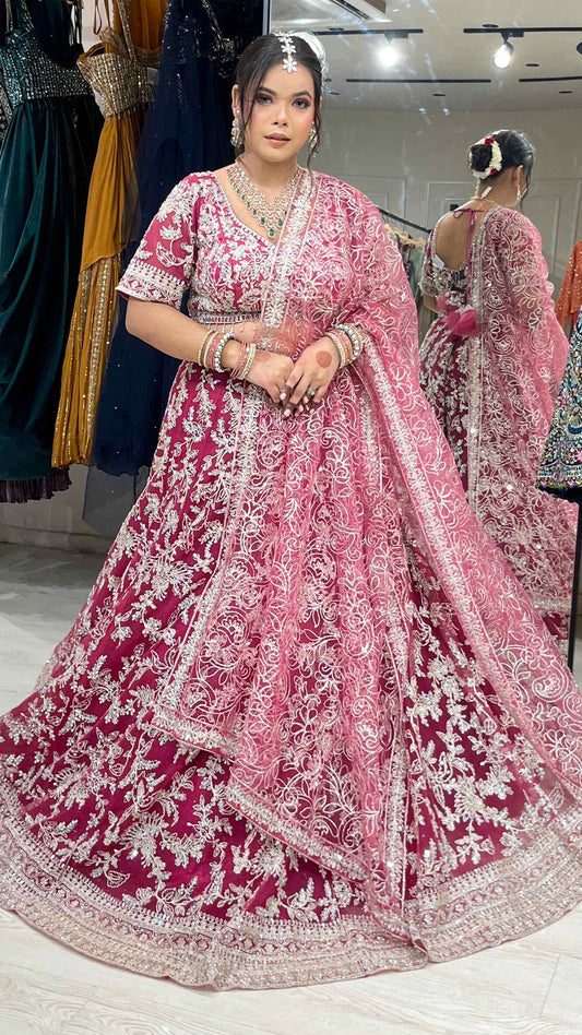 Magenta lehenga with zari & mirror on net with heavy dupatta