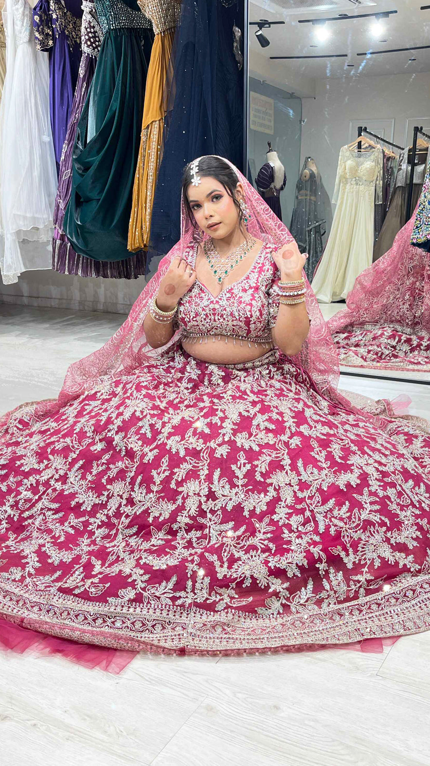 Magenta lehenga with zari & mirror on net with heavy dupatta
