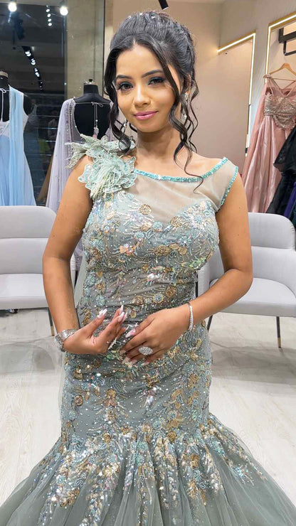 Sea green dust mermaid gown in net with sequins & crystal work