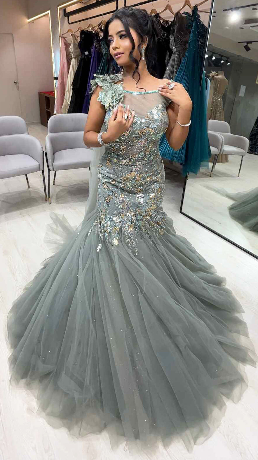 Sea green dust mermaid gown in net with sequins & crystal work