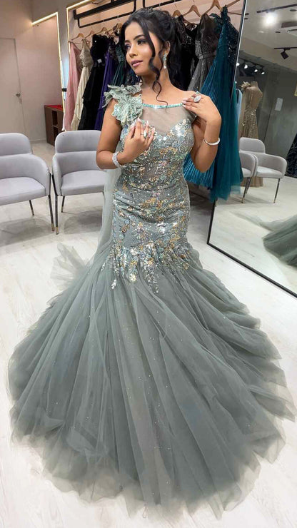 Sea green dust mermaid gown in net with sequins & crystal work