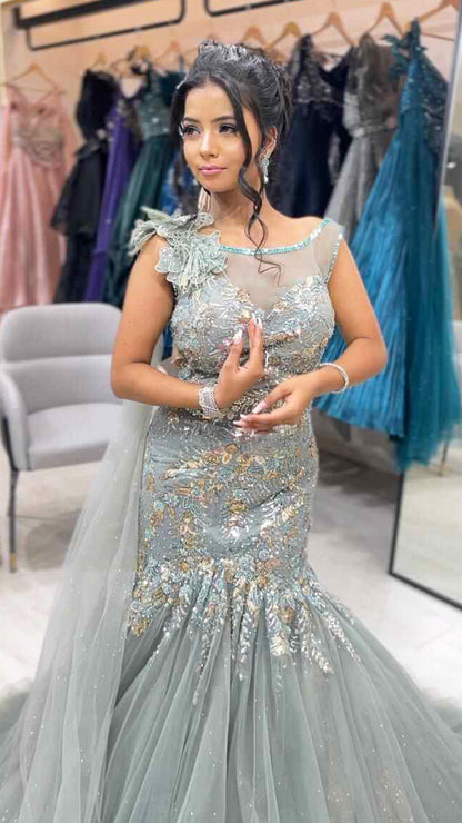Sea green dust mermaid gown in net with sequins & crystal work
