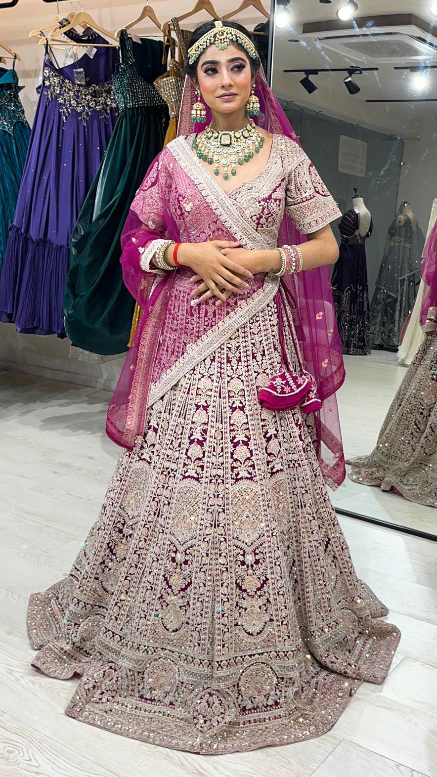 Magenta bridesmaid lehenga with dori &  zarkan work in net