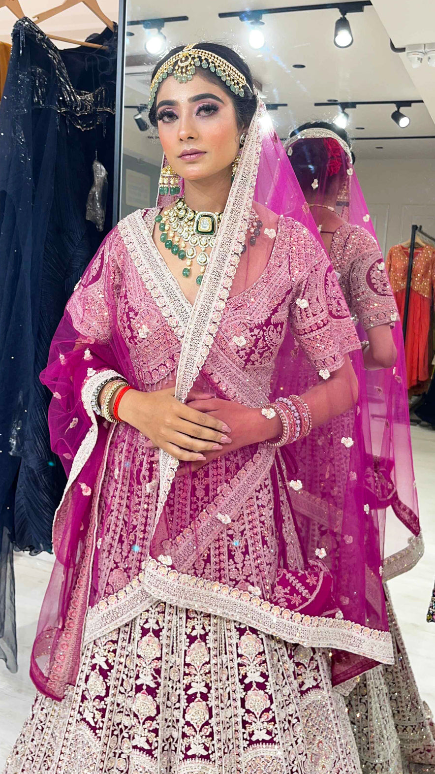 Magenta bridesmaid lehenga with dori &  zarkan work in net