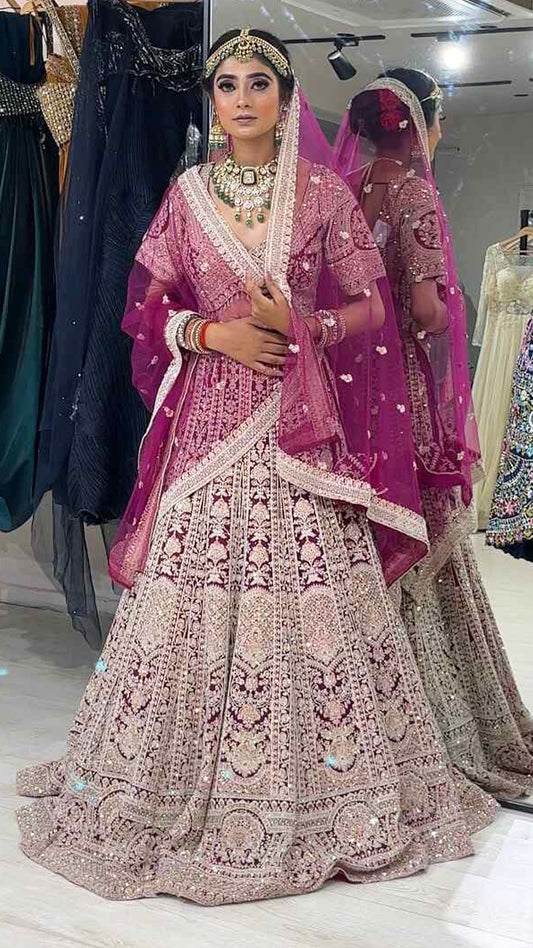 Magenta bridesmaid lehenga with dori &  zarkan work in net