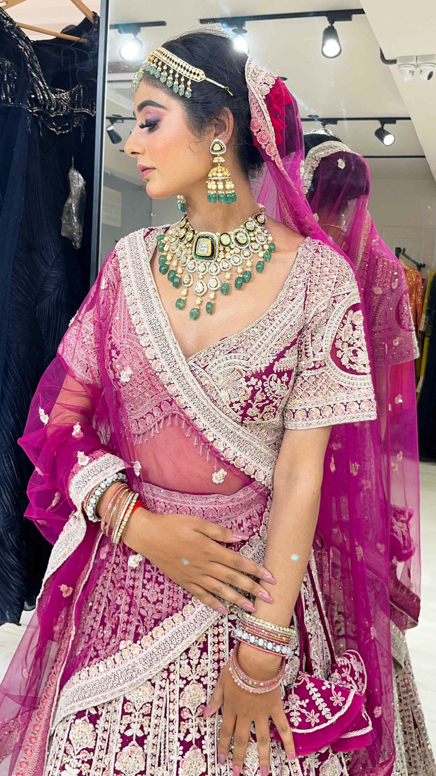 Magenta bridesmaid lehenga with dori &  zarkan work in net
