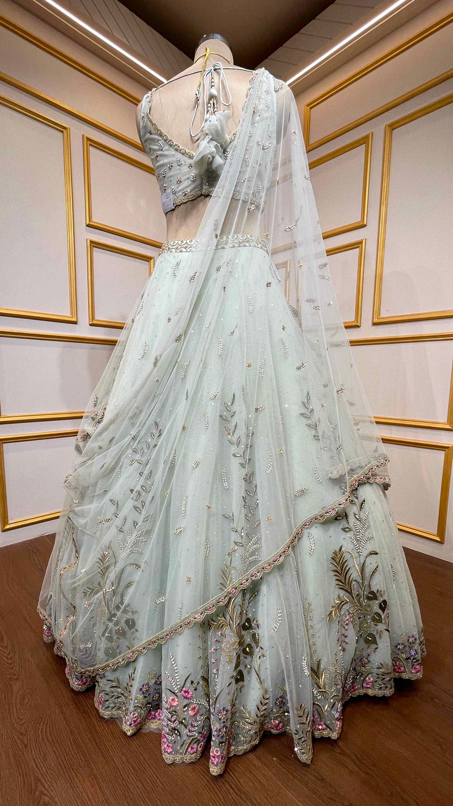 Powder mint engagement lehenga in net with resham & zarkan
