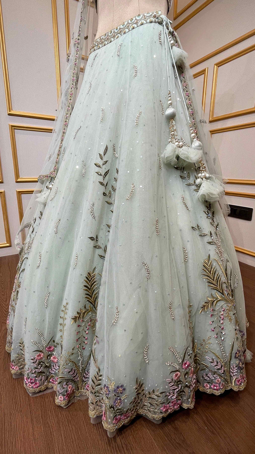 Powder mint engagement lehenga in net with resham & zarkan