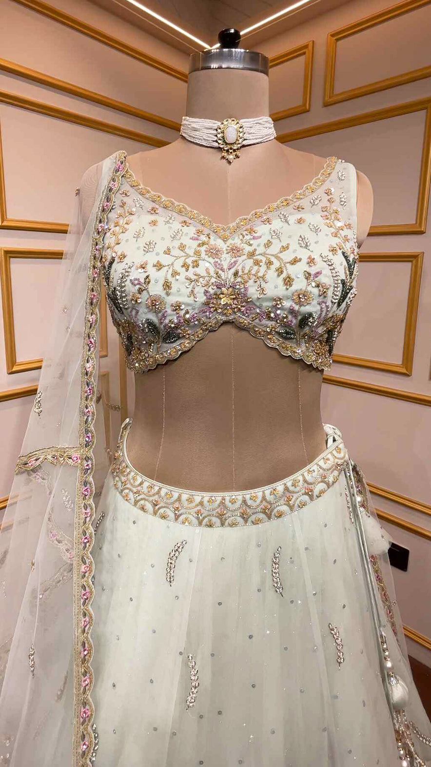 Powder mint engagement lehenga in net with resham & zarkan