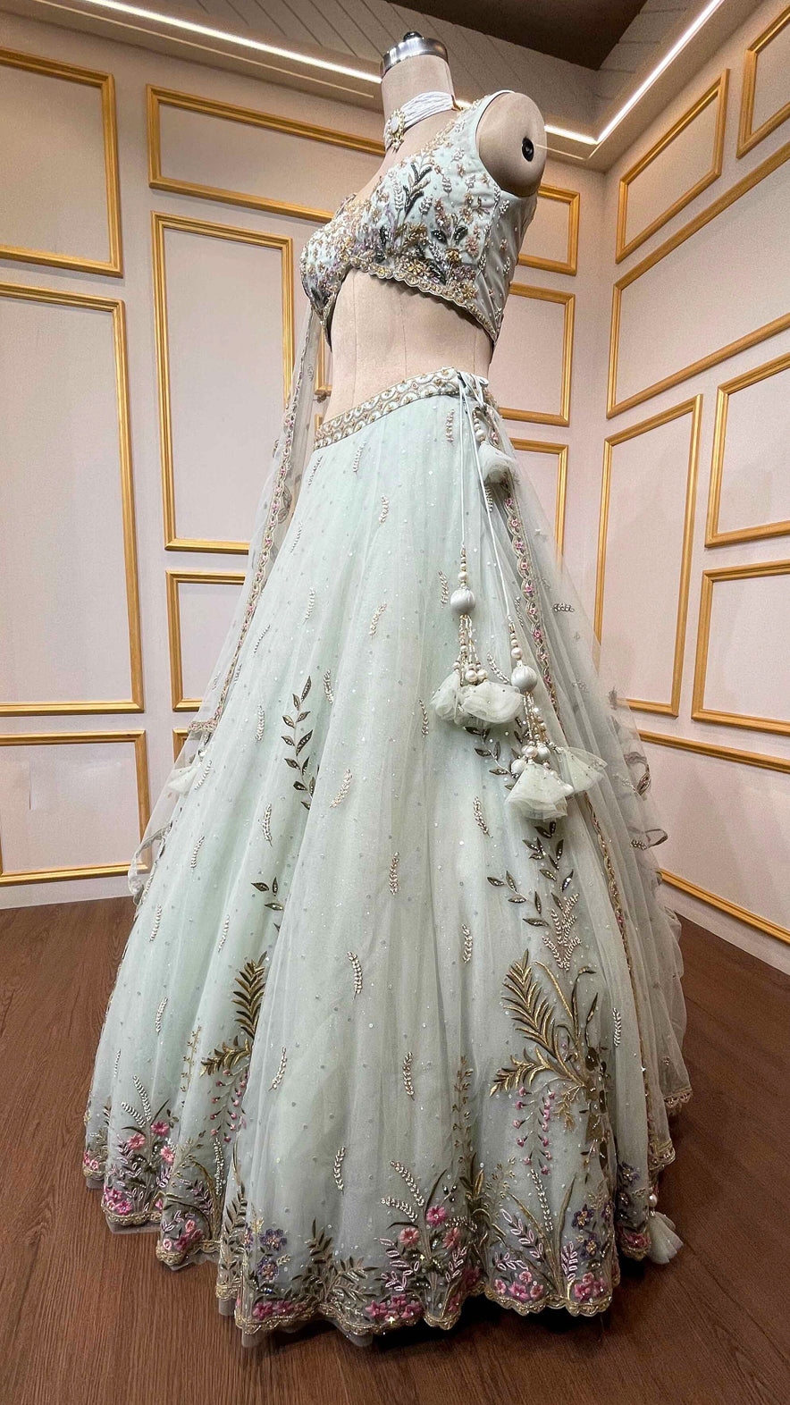 Powder mint engagement lehenga in net with resham & zarkan