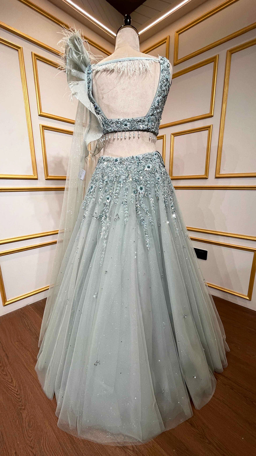 Powder mint green engagement lehenga with sequins & zarkan work on net