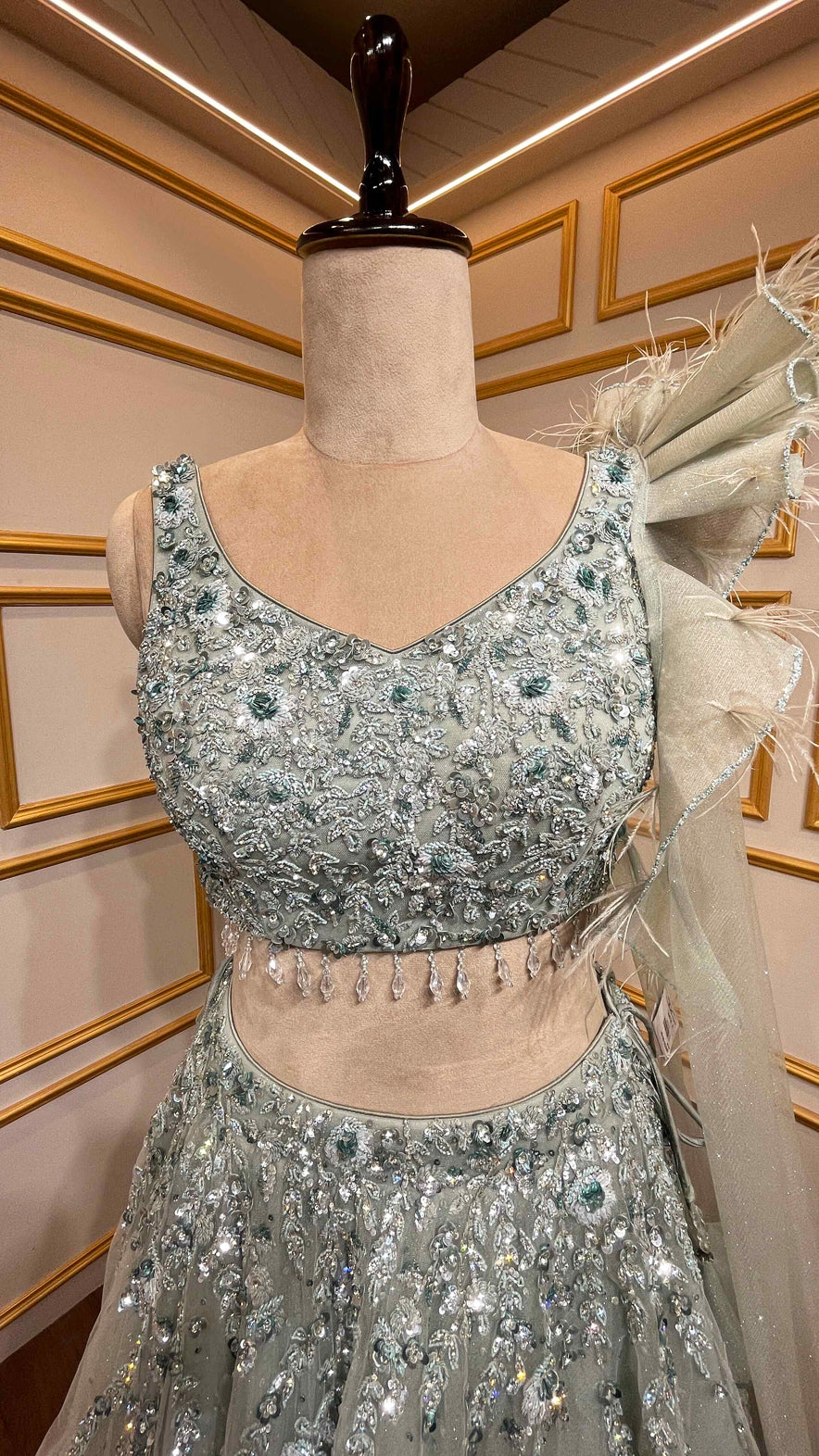 Powder mint green engagement lehenga with sequins & zarkan work on net