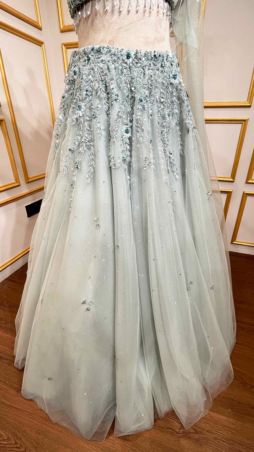 Powder mint green engagement lehenga with sequins & zarkan work on net