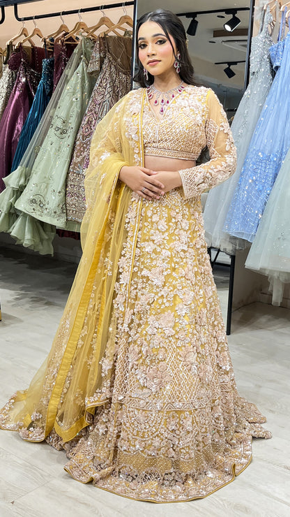 Mustard gold bridal lehenga in net with cut dana & sequins with heavy dupatta