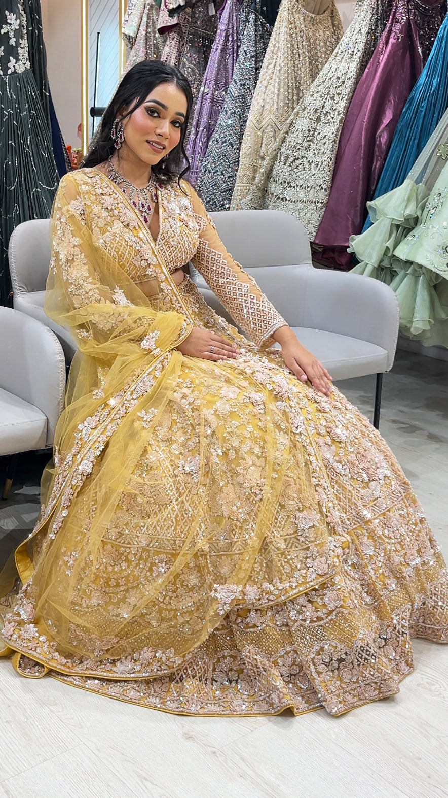 Mustard gold bridal lehenga in net with cut dana & sequins with heavy dupatta