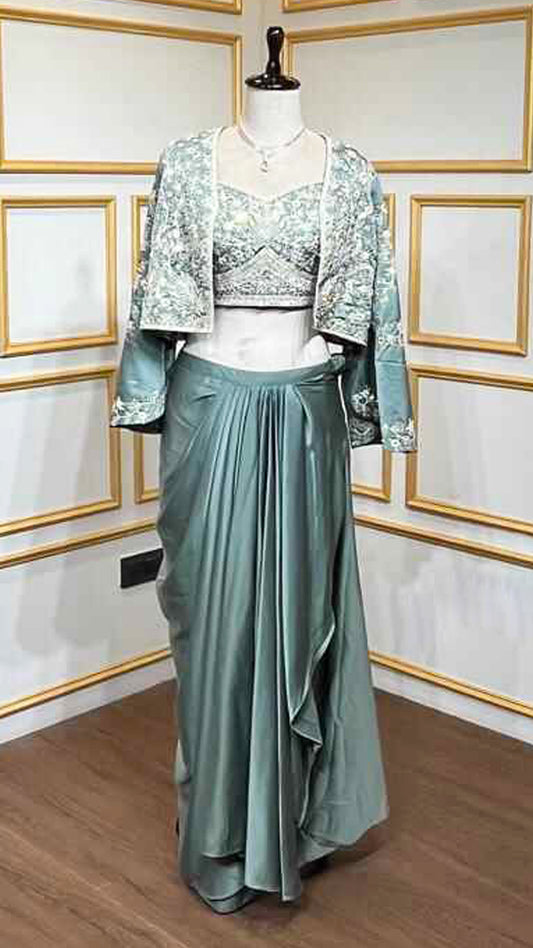 Satin dhoti skirt with thread & crystal work crop top and jacket in pine green