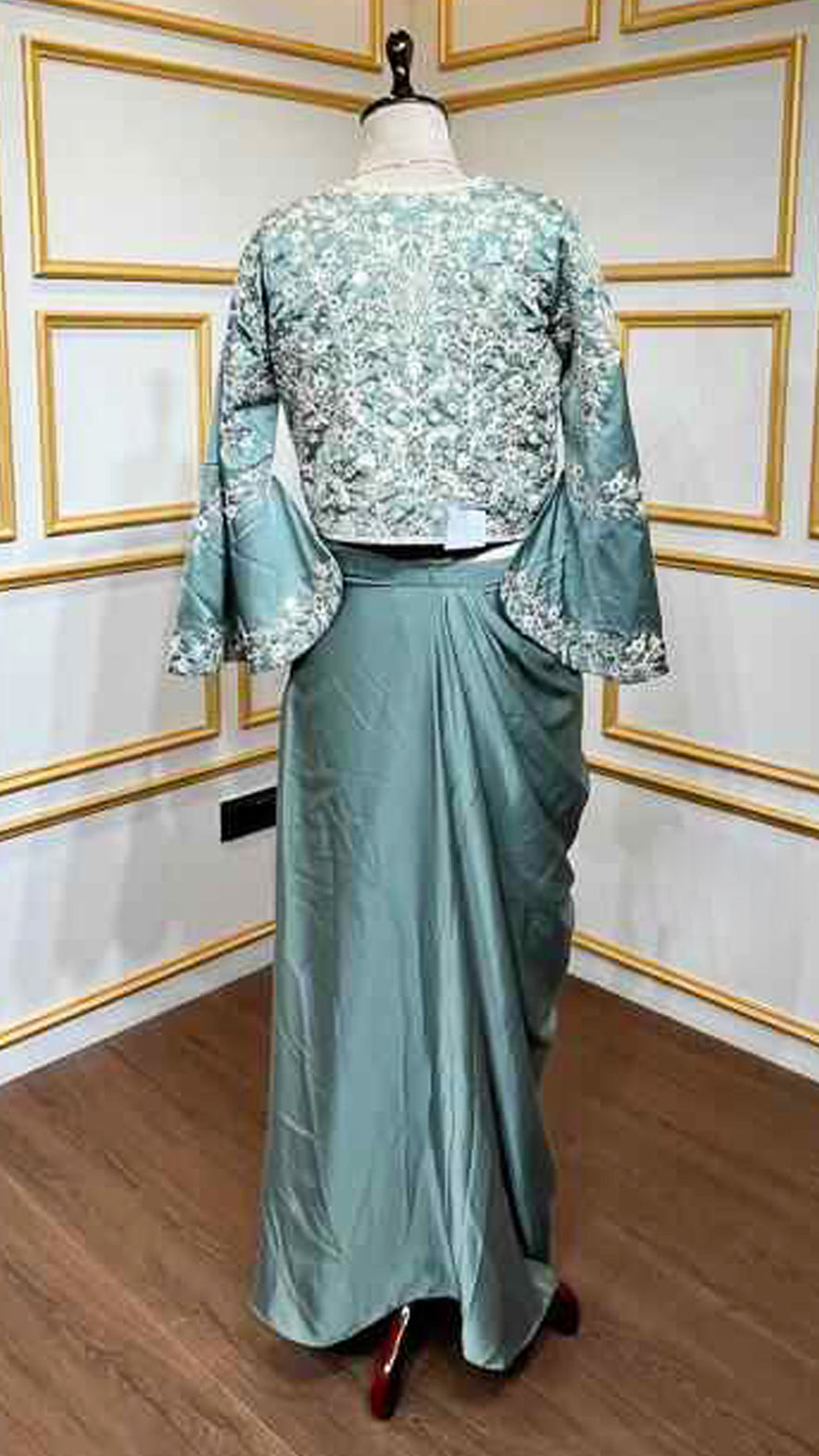 Satin dhoti skirt with thread & crystal work crop top and jacket in pine green