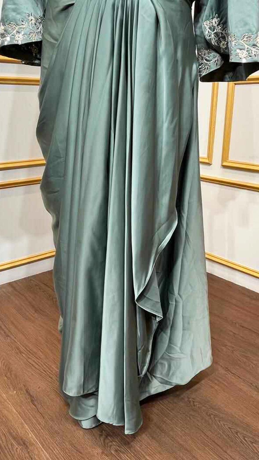 Satin dhoti skirt with thread & crystal work crop top and jacket in pine green