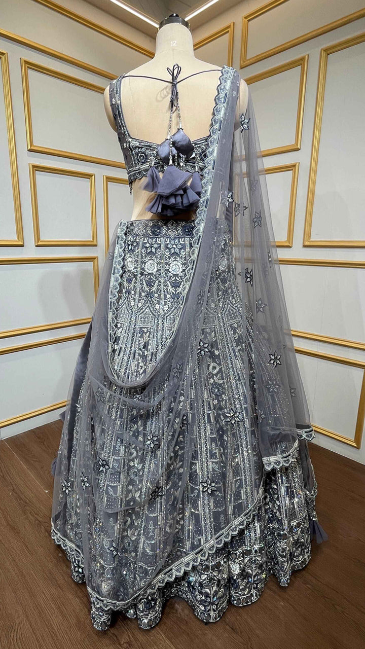 Pearl & resham work on dusty lavender lehenga with cutwork blouse and heavy dupatta