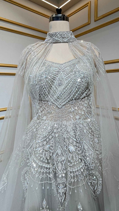 Net engagement gown with zarkan & cut dana work and detachable neck collar in nude beige