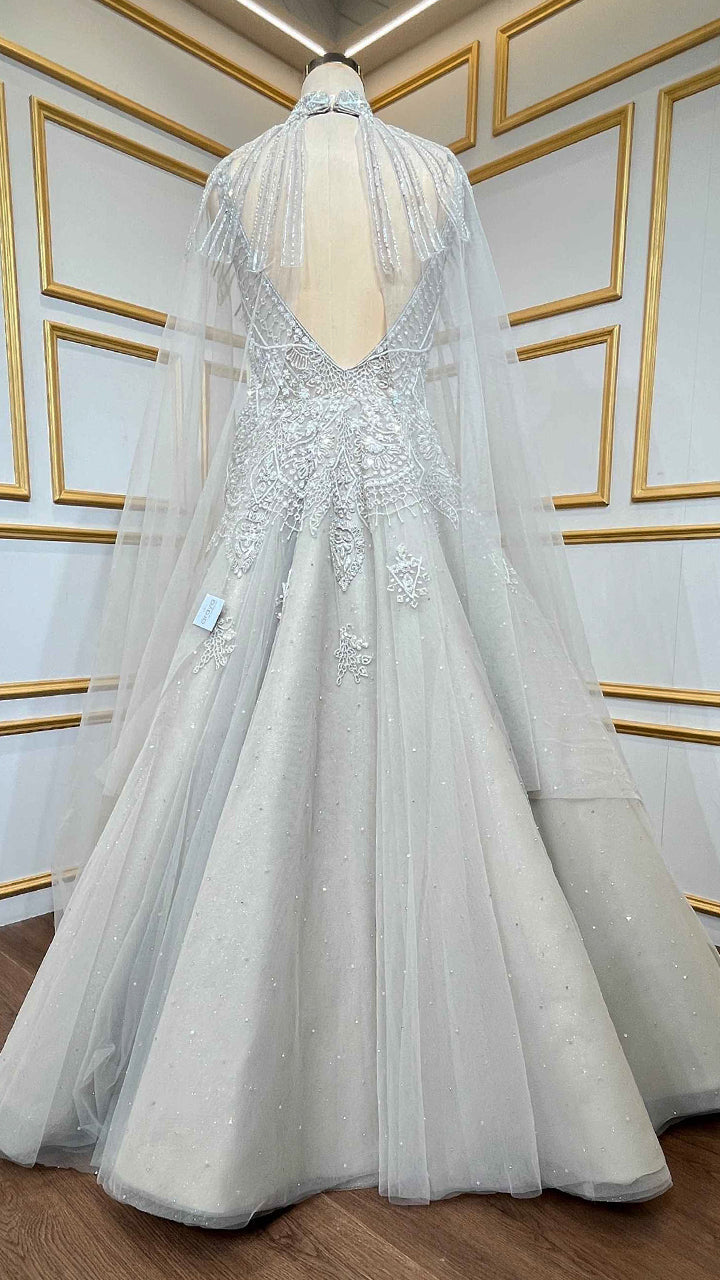 Net engagement gown with zarkan & cut dana work and detachable neck collar in nude beige