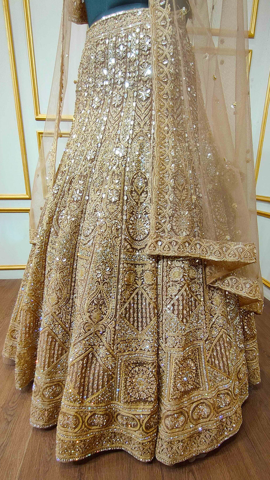 Resham & zarkan work on copper lehenga with heavy dupatta in net