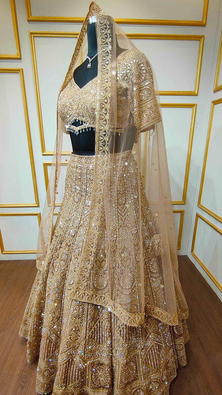Resham & zarkan work on copper lehenga with heavy dupatta in net