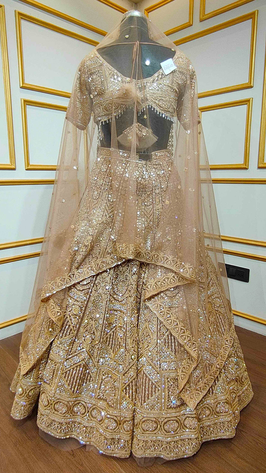 Resham & zarkan work on copper lehenga with heavy dupatta in net