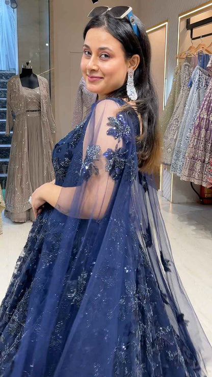 Sequins & tube work on net midnight blue engagement gown with falling sleeves