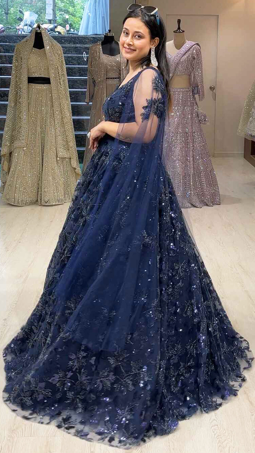 Sequins & tube work on net midnight blue engagement gown with falling sleeves
