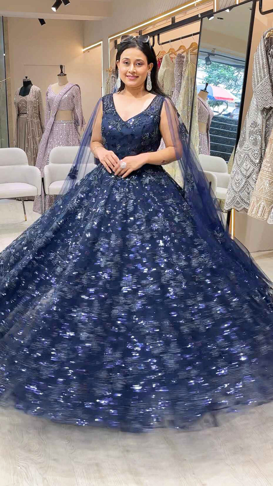 Sequins & tube work on net midnight blue engagement gown with falling sleeves